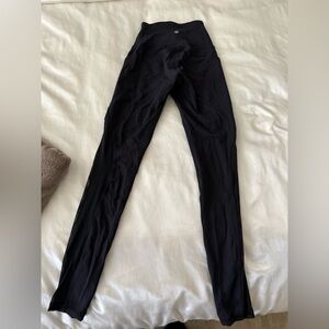 Black Lululemon leggings with mesh sides